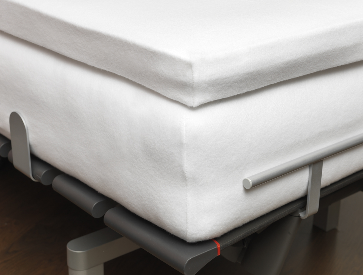 molton-hoeslaken-topper-op-bed